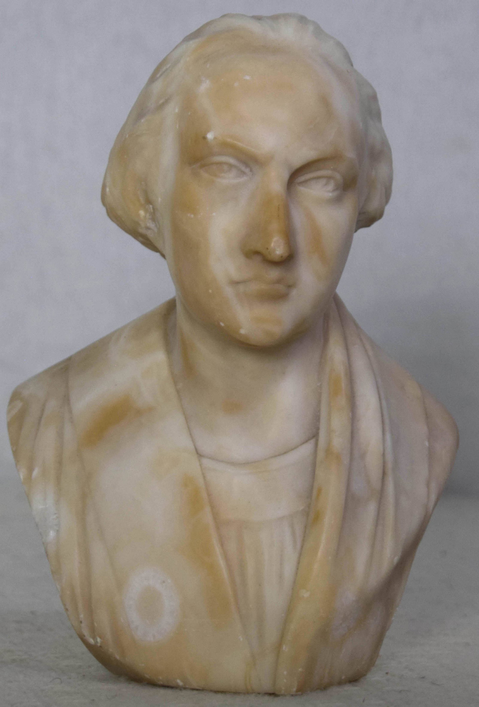 Washington Marble Sculpture: This charming sculpture of George Washington is only 8" tall, but it most assuredly manages to capture the essence of the man. Notice the Roman classical garment he is wearing. We cannot recall ever s