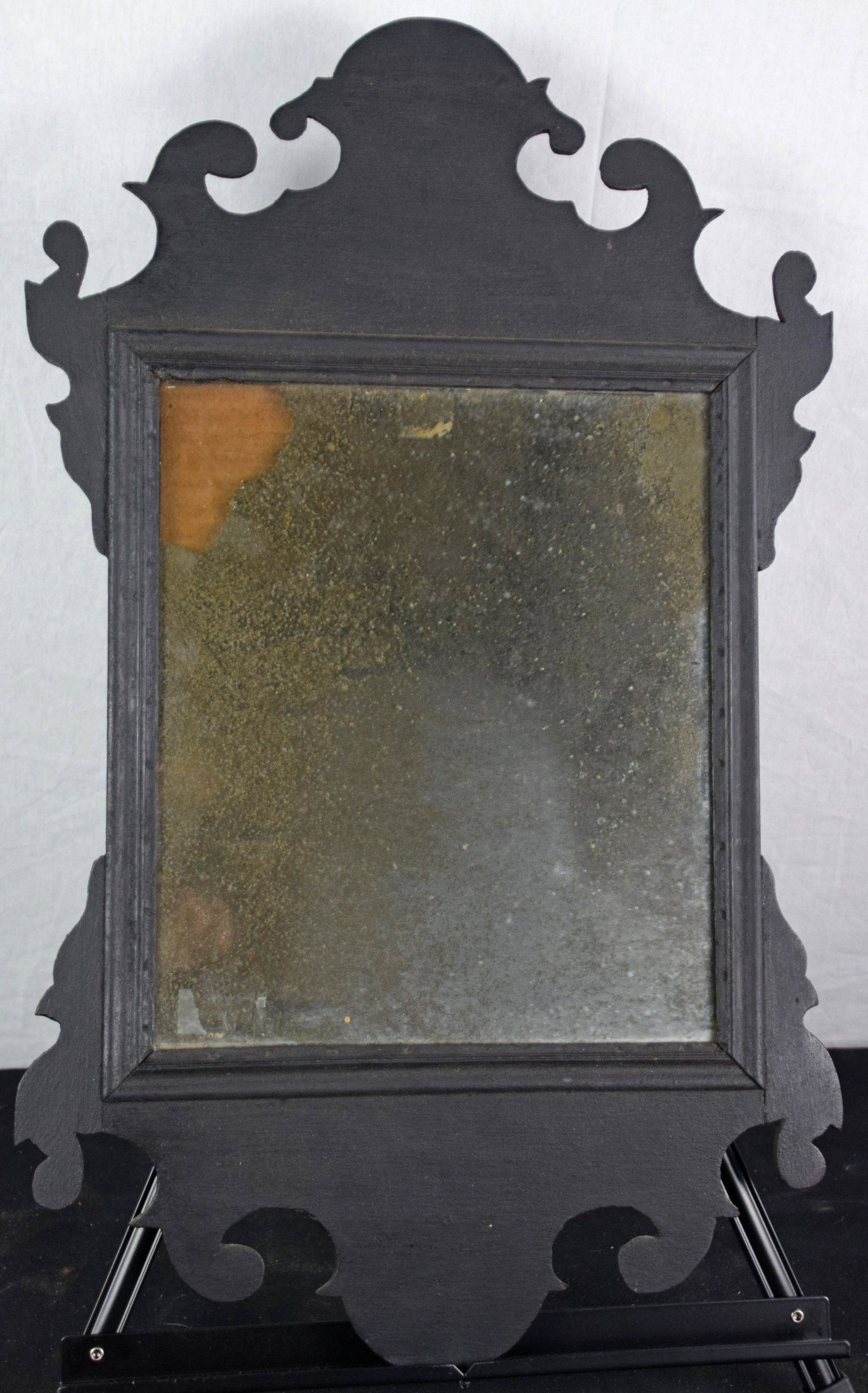 Chippendale Mirror: Chippendale mirror with original glass in black paint. H. 24 in.