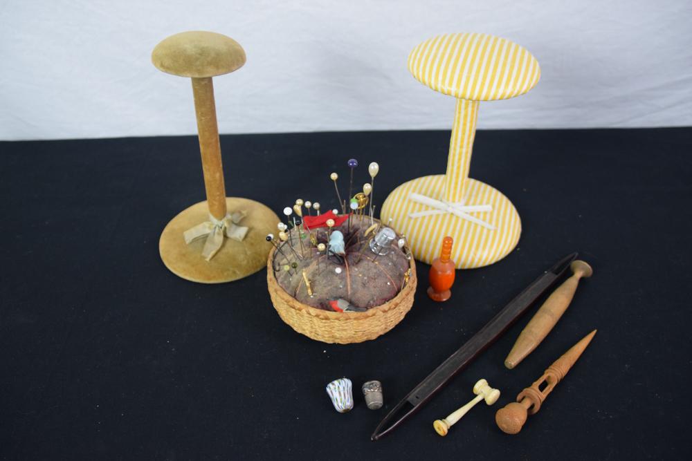 Pin cushion and Thimbles: Sweetgrass pin cushion with hat pins; 2 hat stands; Thimbles (unusual glass, silver, etc.)