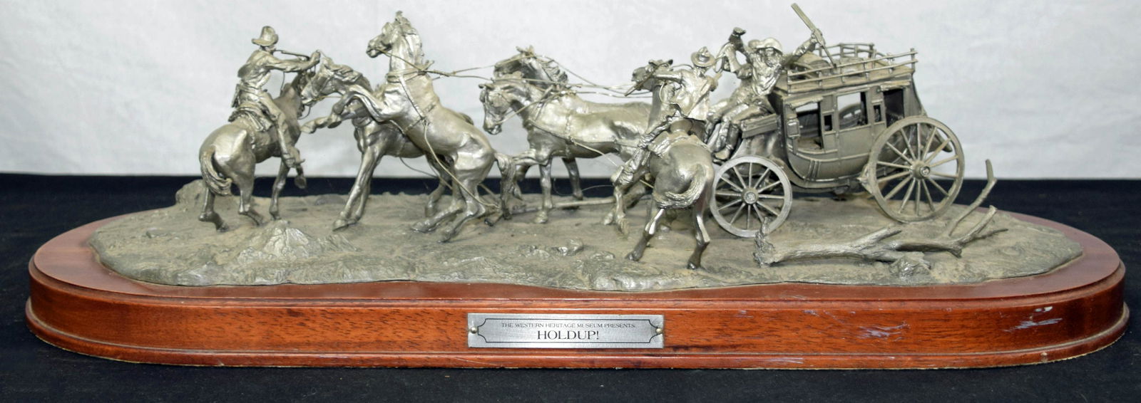Stage Coach Holdup Sculpture.: Metal sculpture/artwork of a stage hold-up scene from the Western Heritage Museum. 22" length by 7.5" width by 8" height