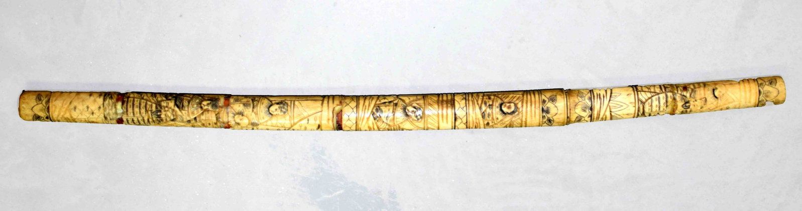 Japanese Samurai Sword: Samurai sword with heavily carved bone case with lords and flowers. Blade length is 15.5" unmarked. Overall length 29.5"