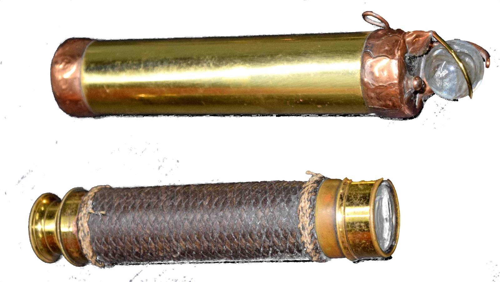 Spy Glass and Primitive Kaleidoscope: Brass spyglass along with a marble based kaleidoscope. Dimensions: 6" Collaspsed and 16" Extended Spyglass, 7" Length for Kaleidoscope