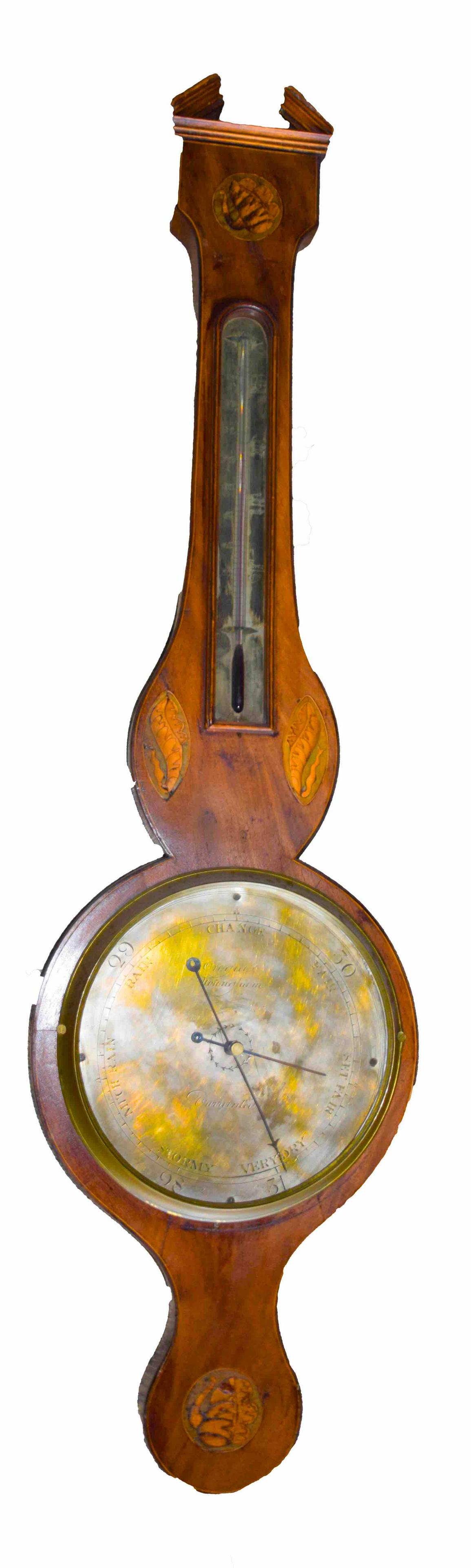 English Barometer: Inlaid wagon wheel English barometer, brass dial signed Nottingham. Conch shell inlay, mahogany. Dimensions: 38" Height