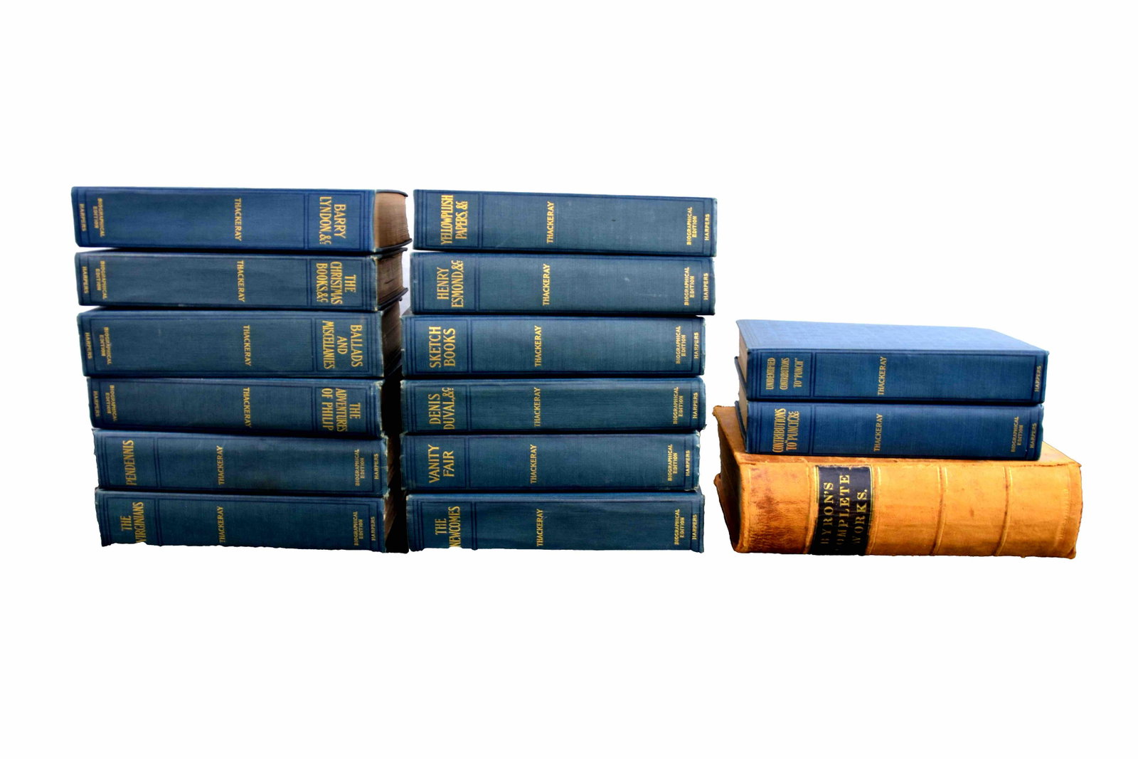 English Lit Set: The Works of William Makepeace Thackeray. and Lord Byron: Complete in thirteen volumes, this Biographical Edition of Thackeray's works is uniformly bound in blue cloth with a darker blue decorative design and gilt lettering to the spine as well as edge gilt.