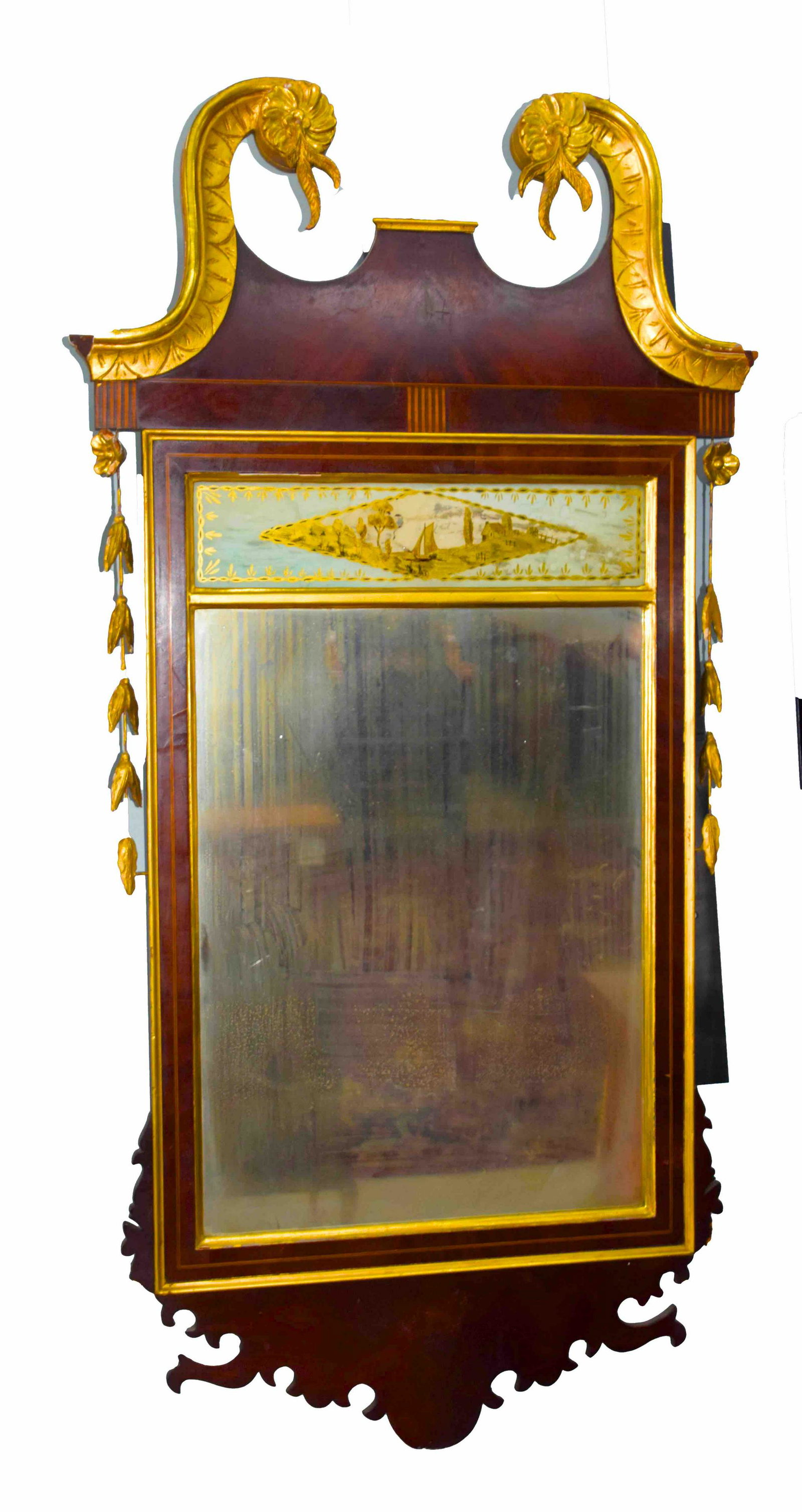 Chippendale Style Mirror: New York Style Chippendale Mirror with gilt crest, eglomise tablet. Mahogany Wood. 45" Height 22.5" Width.