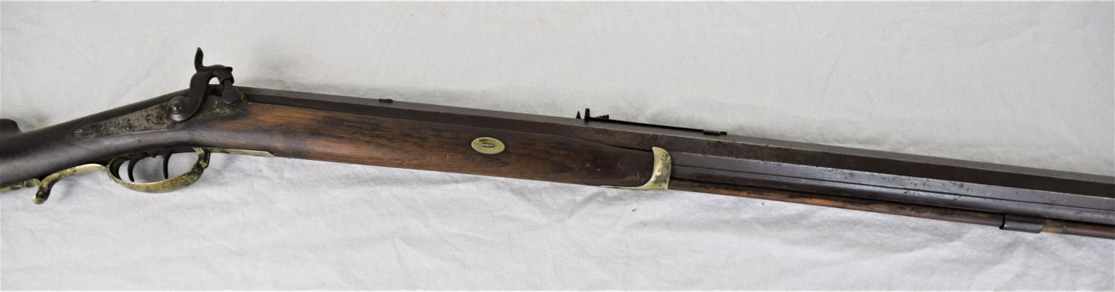 H Pratt Target/Bench Rifle: H Pratt target/bench percussion rifle, octagonal heavy barrel, 36" length, silver trigger guard, wooden original ramrod. H. Pratt worked in Roxbury MA from 1832-1880. Marked H. Pratt on barrel. Dunlap