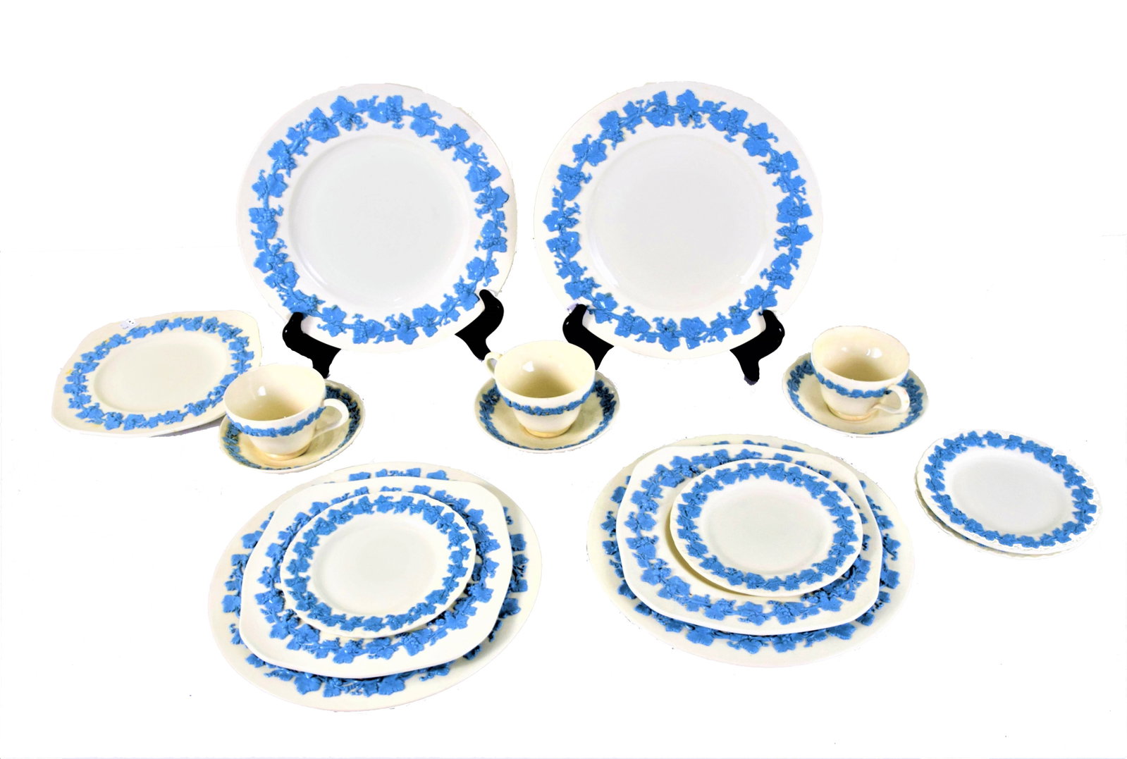 Wedgwood Service For 4: Wedgwood incomplete service for four, embossed Queensware. Set includes four 11" dinner plates, three 9" Lunch plates, four dessert plates, three cups and saucers