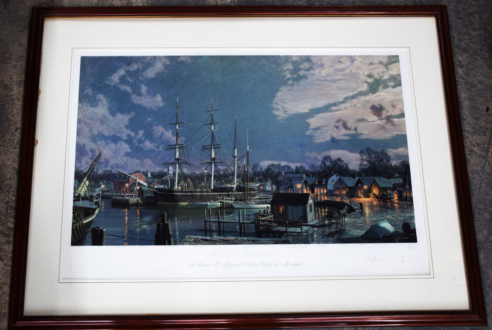 Stobart Art Collection: John Sobart signed lithograph of Mystic Seaport, number 81 of 6141 ( 28" x 37") along with the book "Stobart The Redicovery of America's Maritime Heritage" and a plate " Moonlight, Mississippi" (11" D