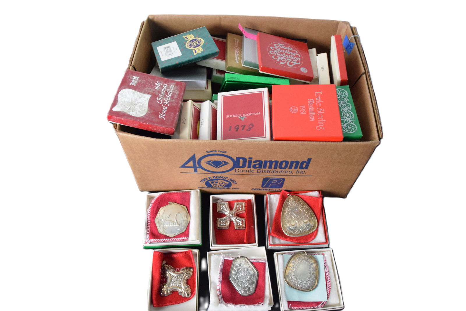 Collection Of Sterling Crosses: Collection of over 50 Sterling Christmas crosses from the 1970s to 2000's most in original boxes including the following makers-Reed and Barton, Gorham, Towle