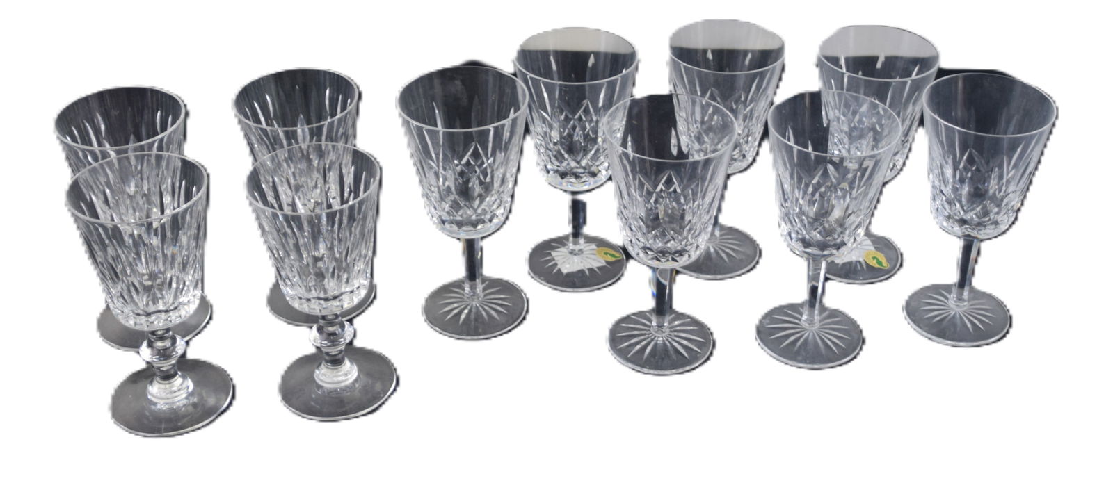 Waterford Goblets: Eleven Waterford wine glasses including 7 red (7" H) and 4 white (6.5"H) wines on a pedestal base.