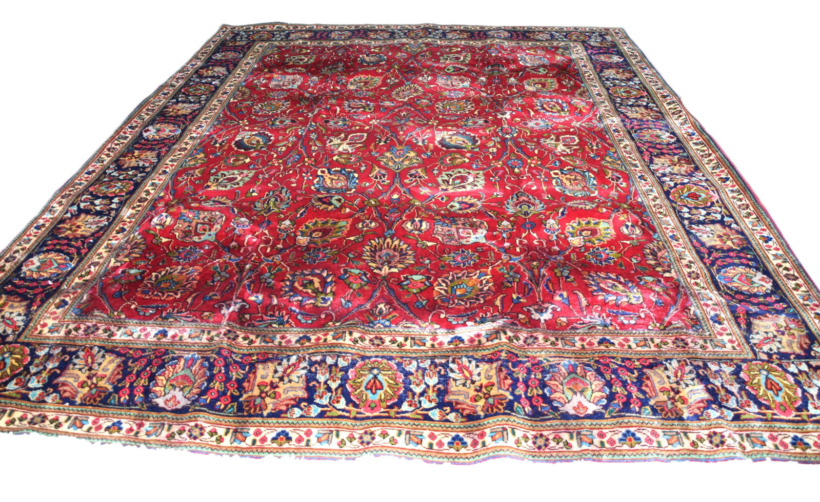 Room Size Oriental Rug: Room size oriental rug with multi-color designs with a predominate red field with all over designs. From a Bedford NH estate. Dimensions: 10' 1" x 12'8"