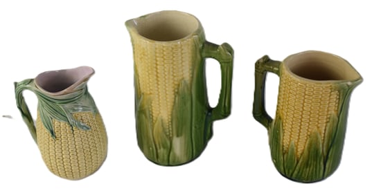 Three Majolica Corn Design Pitchers