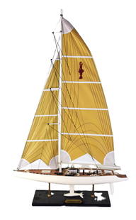 America's Cup Ship Model: America's Cup sailing ship model with a double sailing mast and with a label "America's Cup", resting on a wooden base. From the David Sargent Collection, New London, NH. Dimensions: 36" H x 24" L