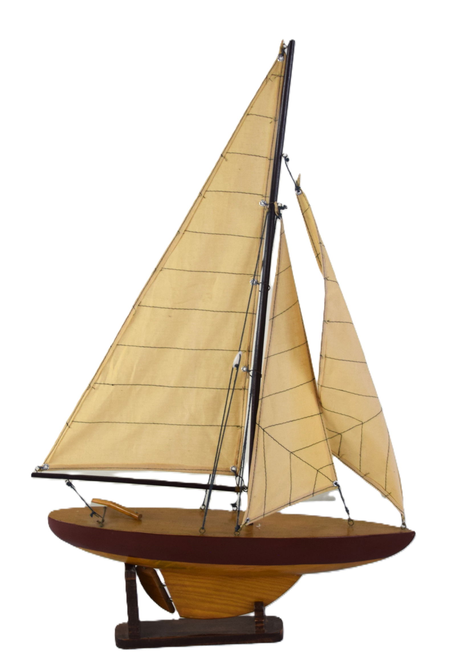 Pond Boat: Carved wooden Boston pond boat with sails and mast resting on a wooden base. From the David Sargent Collection, New London, NH. Dimensions: 25" H x 15" L