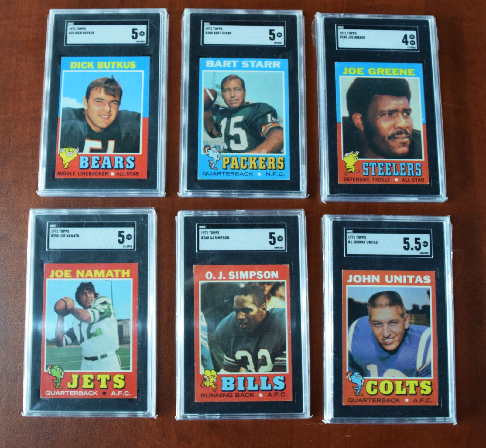 6 Graded 1971 Football Cards: Six graded 1971 football cards including Mean Joe Greene (4.0), O.J. Simpson (5.0), Joe Namath (5.0), Bart Starr (5.0), Dick Butkus (5.0) and John Unitas (5.5)