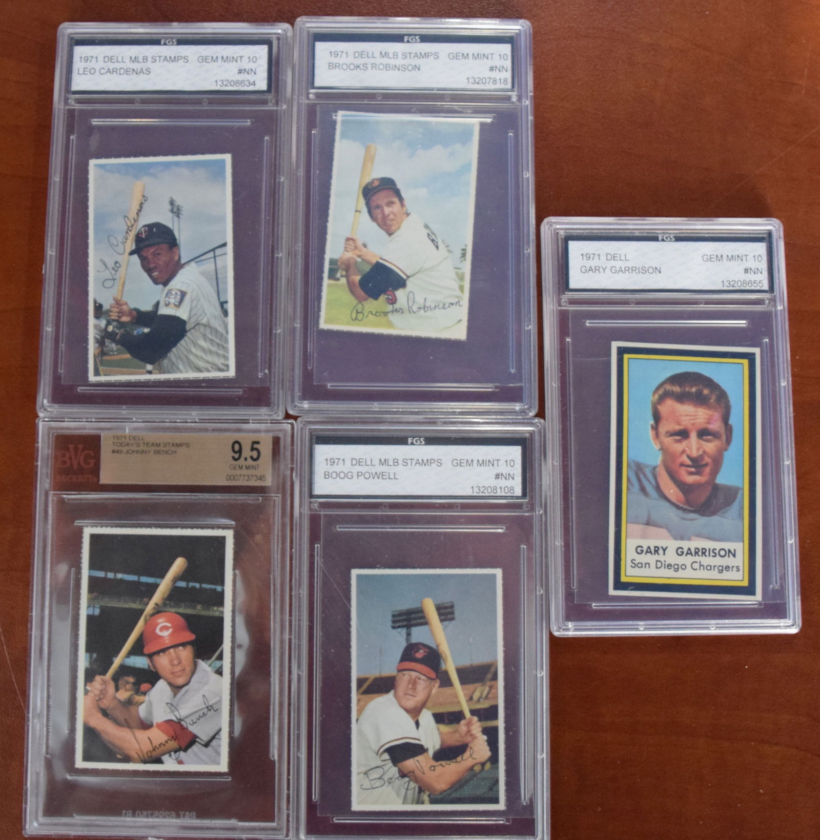Five 1971 Dell Stamps: Five 1971 Dell stamps to include Brooks Robinson (Graded 10), Leo Cardenas (Graded 10), Jonny Bench (Graded 9.5), Boog Powell (Graded 10) and football Gary Garrison of the San Diego Chargers (Graded