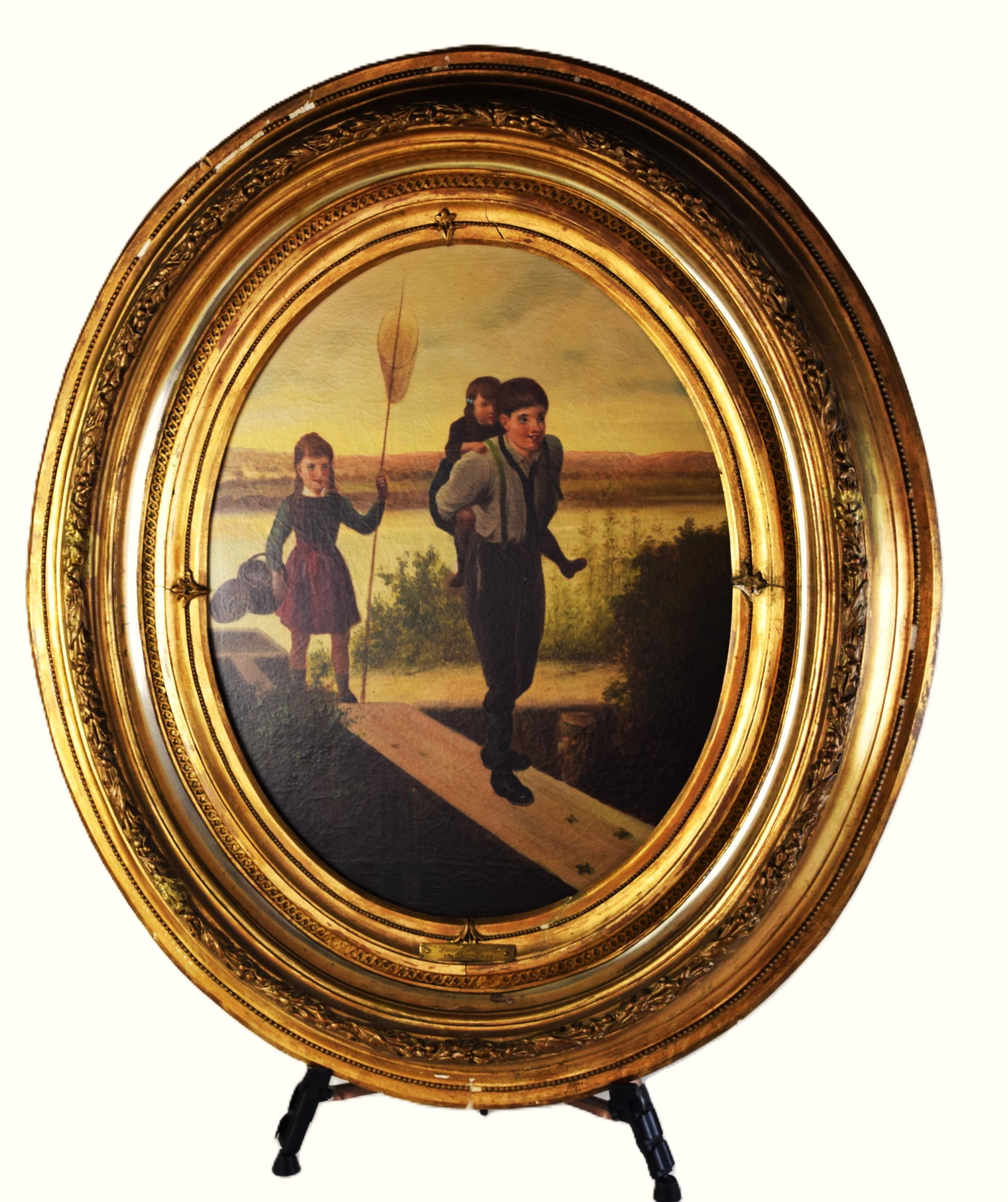 H. Layman Oil Painting Of Young Anglers: Oval framed oil painting on canvas of three young angler's, signed lower right by H. Layman, circa late 19th Century/early 20th. "Children Returning from Fishing" by H. Layman appears to be a genre