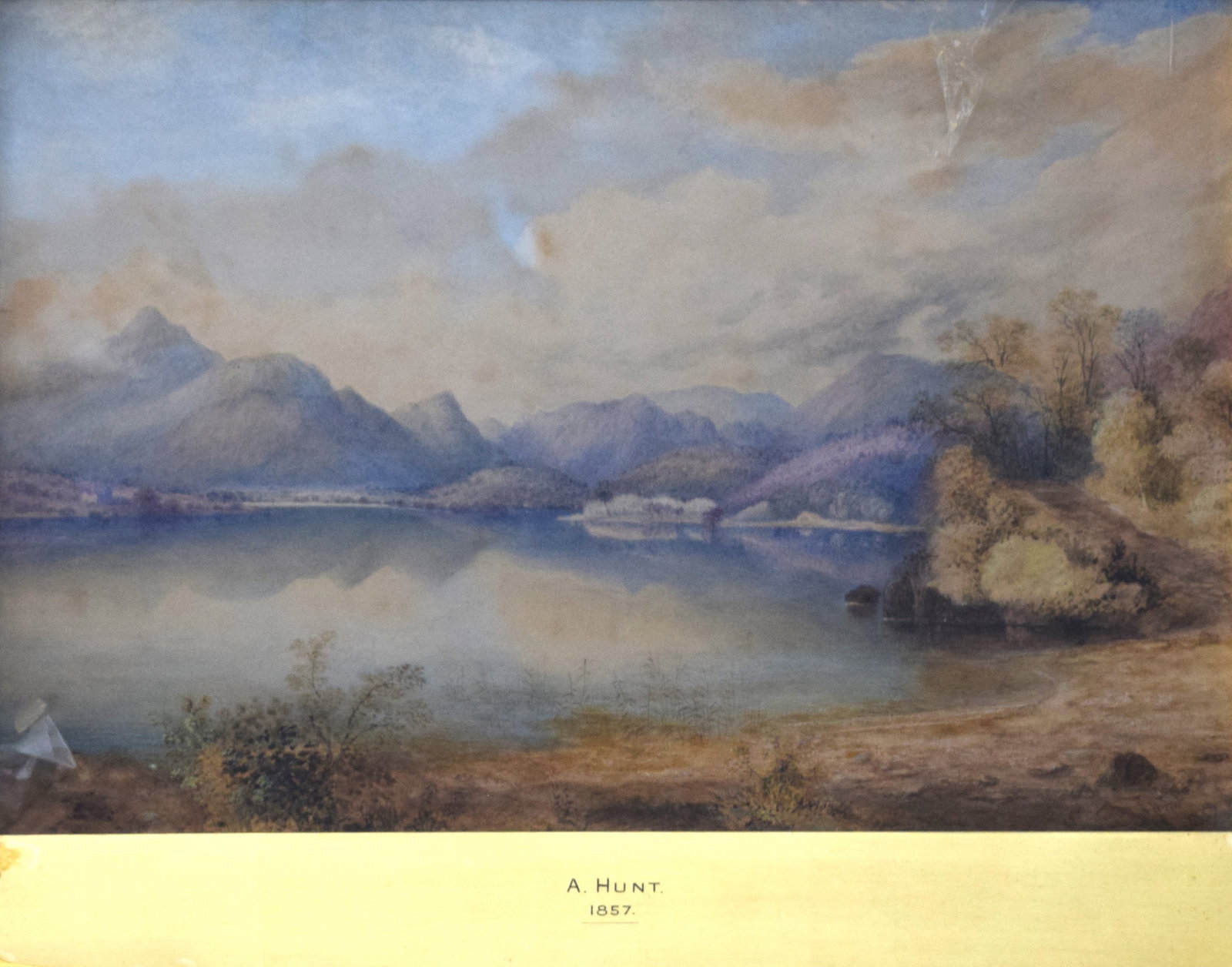 Alfred W. Hunt Landscape Watercolor: Framed and signed landscape watercolor of a lake and mountains. Signed lower right, A. Hunt, 1857. Alfred William Hunt was a landscape painter and watercolorist who was first associated with the Liver