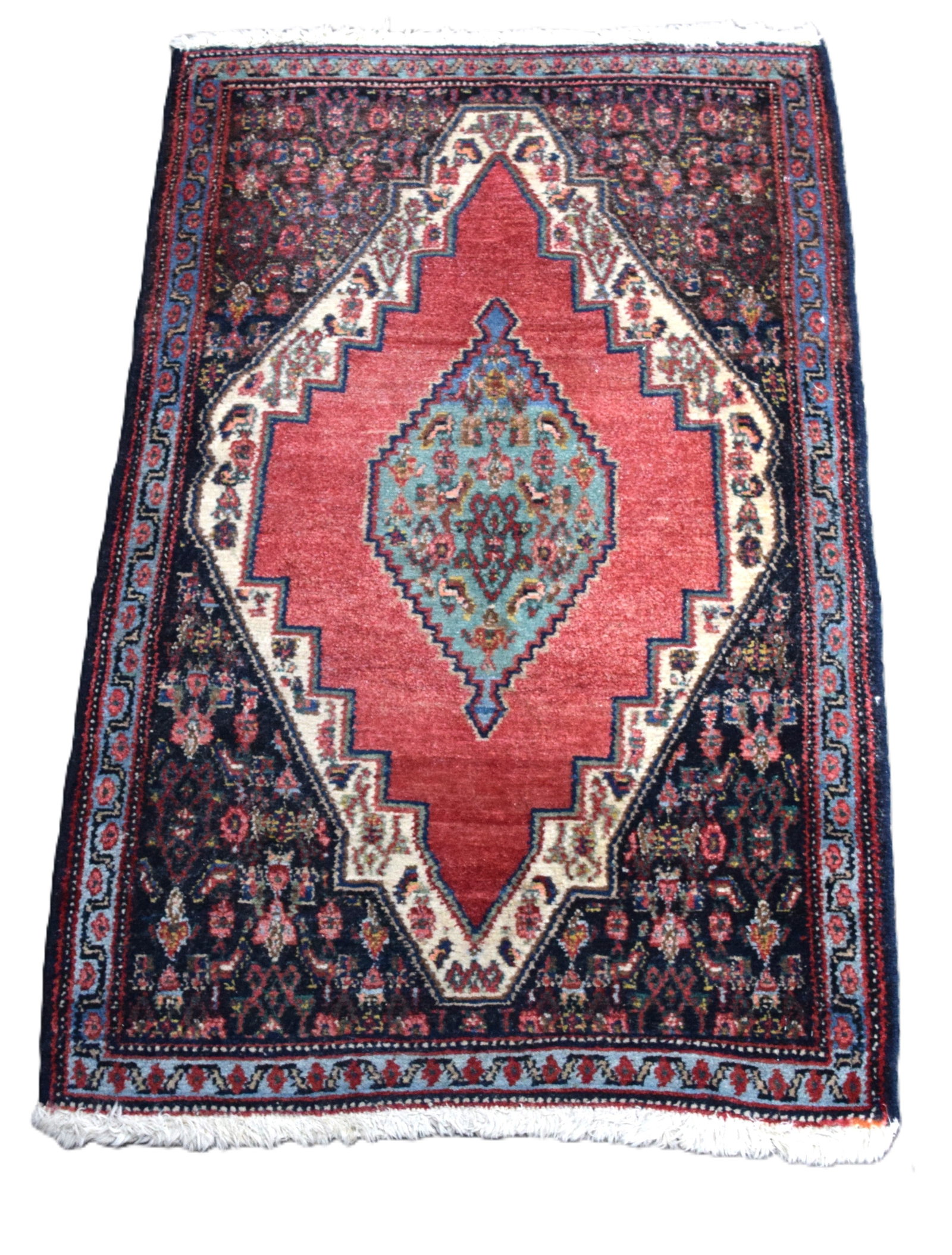 Oriental Scatter Rug: Fine oriental scatter rug with large center medallion, multi-color with reds, blues and ivory soft colors. From a New London NH home. Dimensions: 2' 4" x 3' 8"