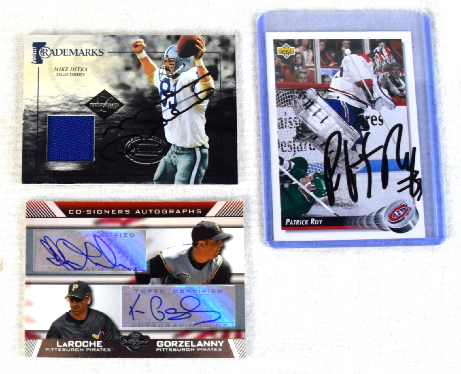 Signed Sports Cards -Patrick Roy Card, Adam LaRoach, Mike Ditka: Signed sports cards to include Patrick Roy upper Deck 92-3 # 149, Mike Ditka, Trademarks #14 of 50, and Topps Adam LaRoach and Tom Gorzelanny of Pittsburg Pirates #CS-LG