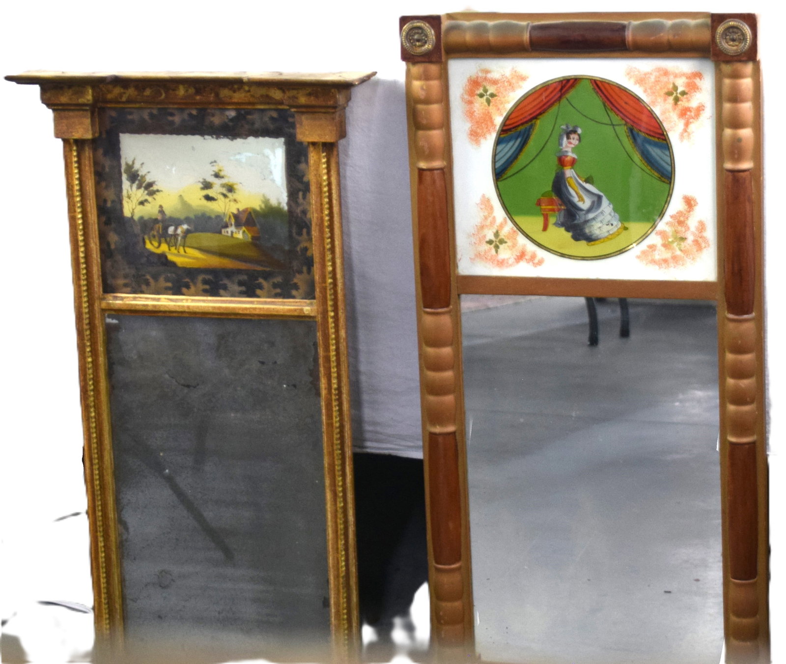 Two Federal Mirrors: Two Federal mirrors with reverse painted glass, one Jenny Lind and one gilt wood with a horse and buggy on a country road, tablet with original glass. Dimensions: 30" and 32,5" H