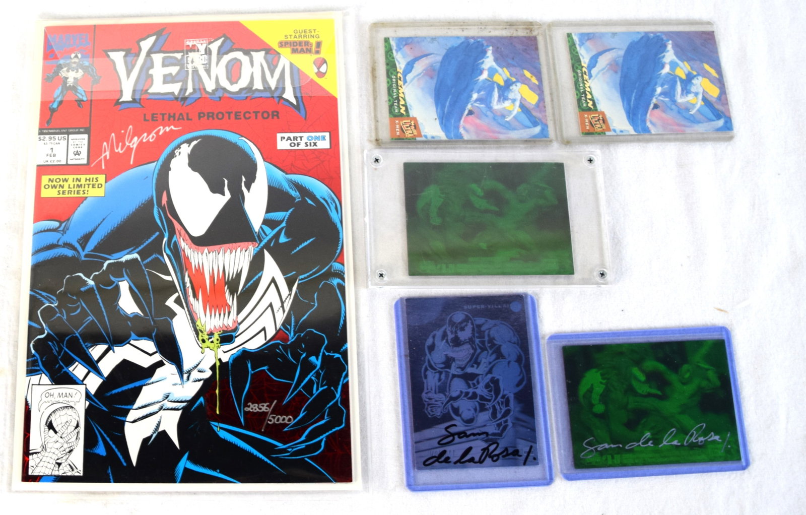 Sam de La Rosa Signed Venom Holograph Cards And Venom #1 Comic: Sam de La Rosa Signed Holograph Cards including 1992 Super Villain Venom #H-4, Marvel 1993 Spiderman vs Venom (one signed another unsigned) and two misprints ICEMan Fleer 1994, along with Venom: