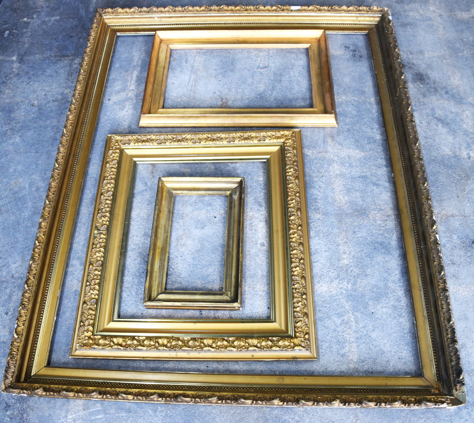 Collection Of Nine Picture Frames: Collection of nine Picture frames including some bird's eye maple, gilt wood, and walnut. Dimensions: Range from 12" x 10" to 57" x 44: