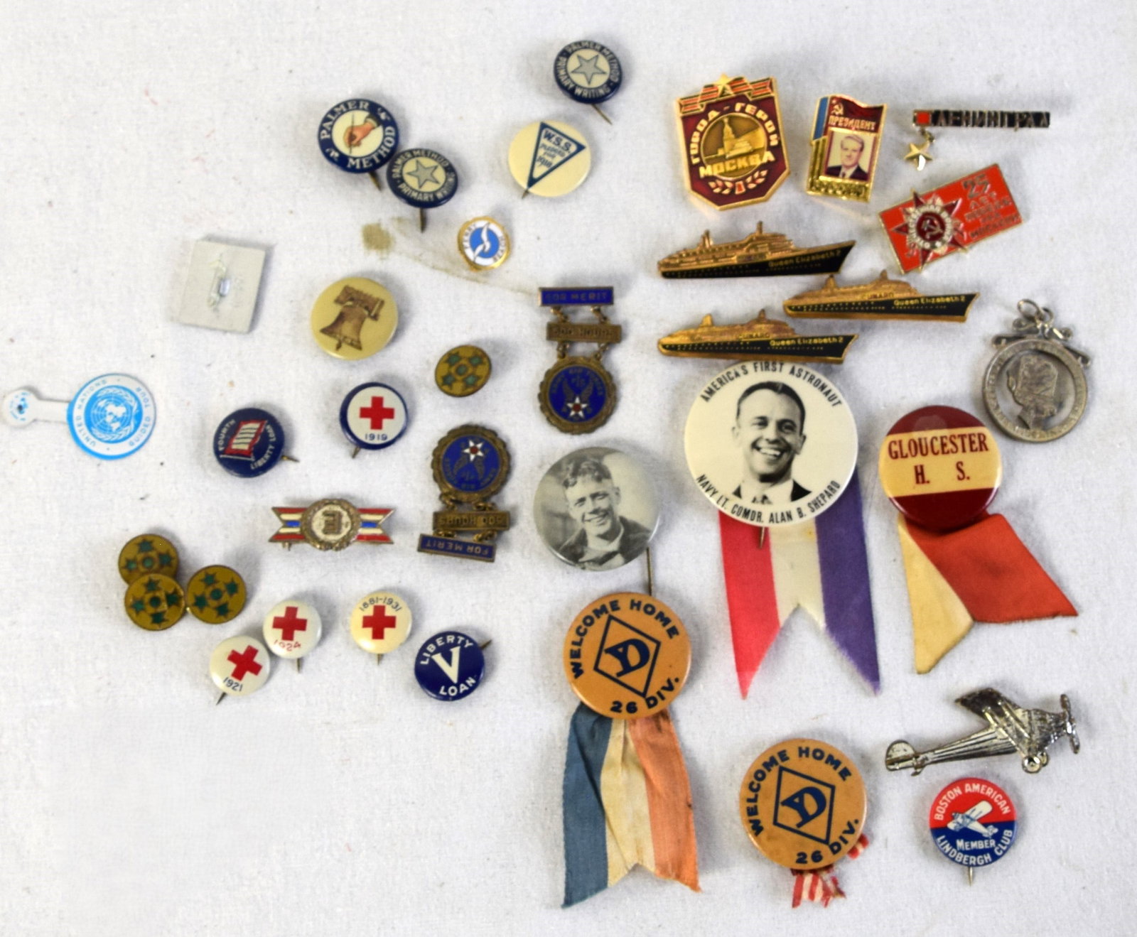Miscellaneous Buttons To Include Patriotic, Russian, And Alan Shepard: Miscellaneous button lot to include Alan Shepard as the first Astronaut, Welcome home 26 Infantry Division, Red Cross buttons, Russian buttons, Queen Elizabeth 2 ships and more