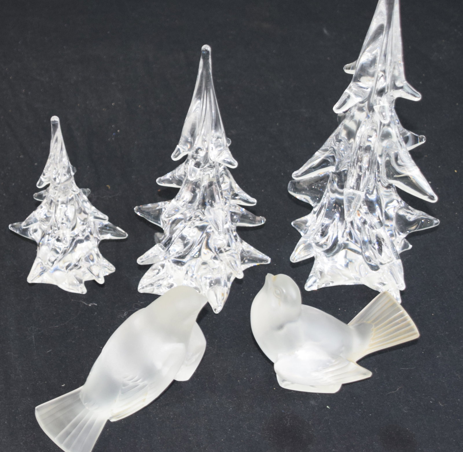 Lalique Lot: Two Lalique birds marked Lalique along with a crystal tree set marked "Clichy France". Dimensions: Birds 4" H and 5" L , Trees 6", 8" and 10" H