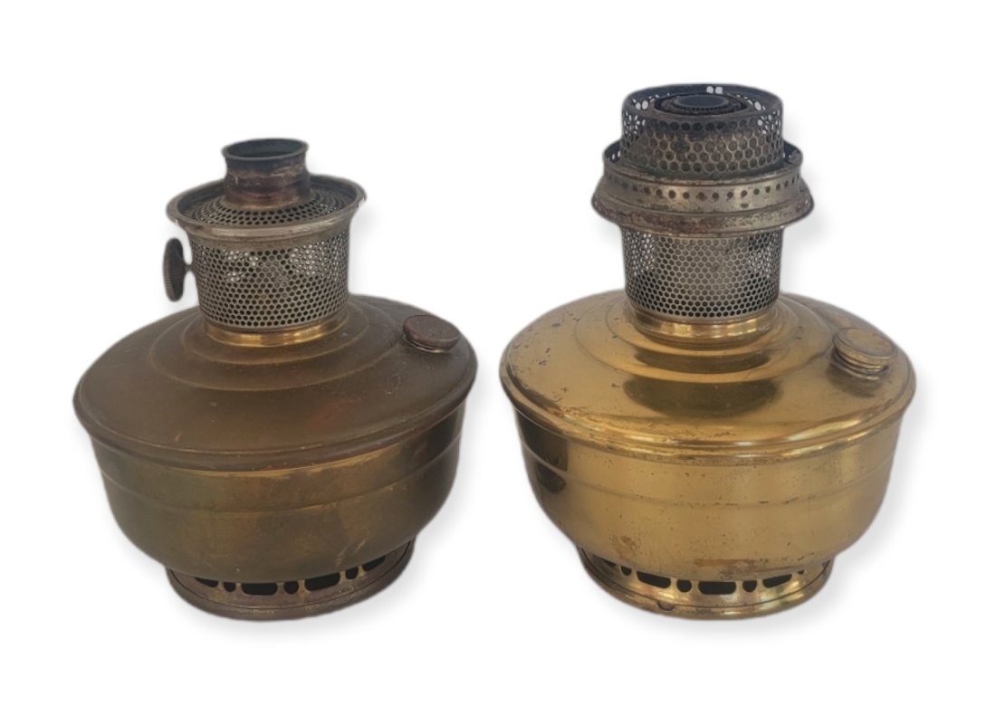 TWO ALADDIN NO.12 OIL BRASS LAMPS: Two Aladdin No. 12 Oil Lamps. One measures 7" and one measures 7.5"