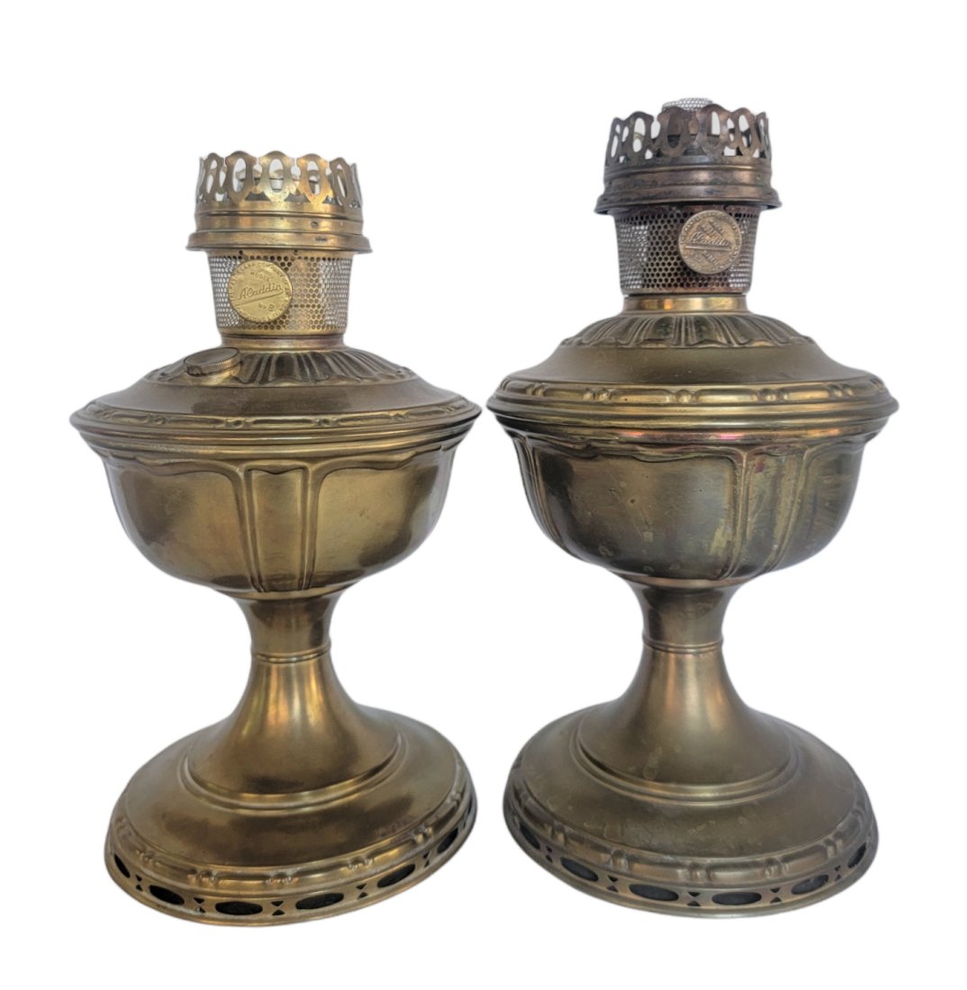 ALADDIAN c1920'S BRASS OIL LAMPS (2): Aladdin Brass Oil Lamp No 8 and No 11. Measures approximately: 11.5" to 12"