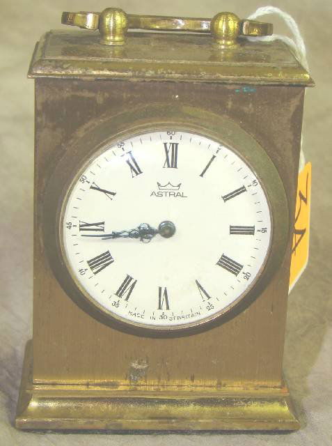 MINIATURE BRASS ASTRAL CARRIAGE CLOCK: MINIATURE BRASS ASTRAL CARRIAGE CLOCK, 20thC, keyless movement with white enamel face, 8cms tall