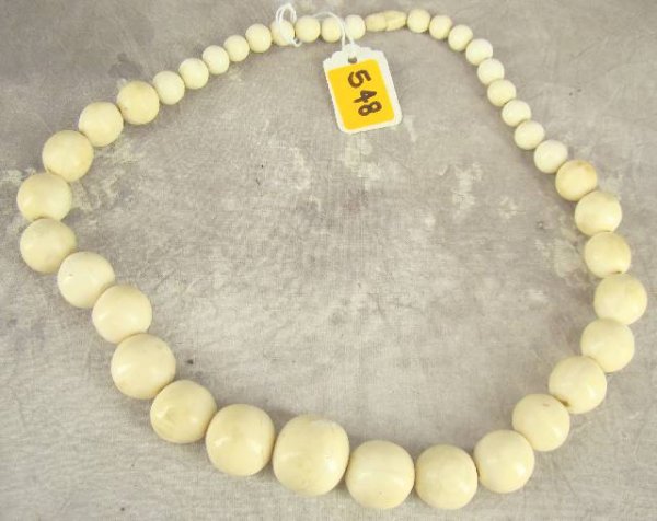 VINTAGE CARVED IVORY NECKLACE WITH GIANT SIZE GRA