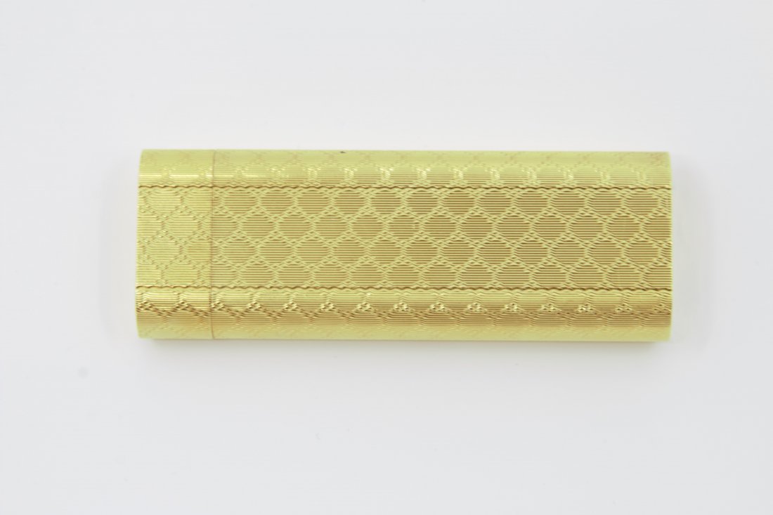 Cartier Lighter: Briquet Cartier plaquÃ© or, pierre d'allumage manquante Cartier gold-plated lighter, missing ignition stone