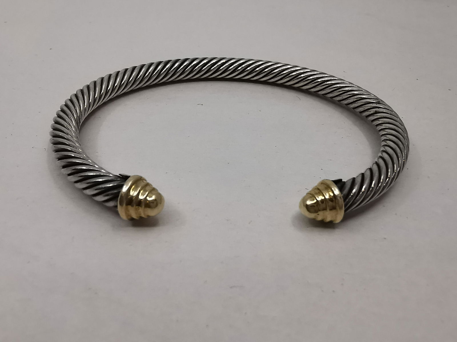 David Yurman .925 and 14KT Cuff bracelet: Artist: David Yurman USA Title: Sterling silver .925 and 14KT gold Cuff Bracelet Description (FR): Bracelet en argent sterling .925 et or 14KT, poincon a l'interieur D.Y, .925, .585 Description (ENG):