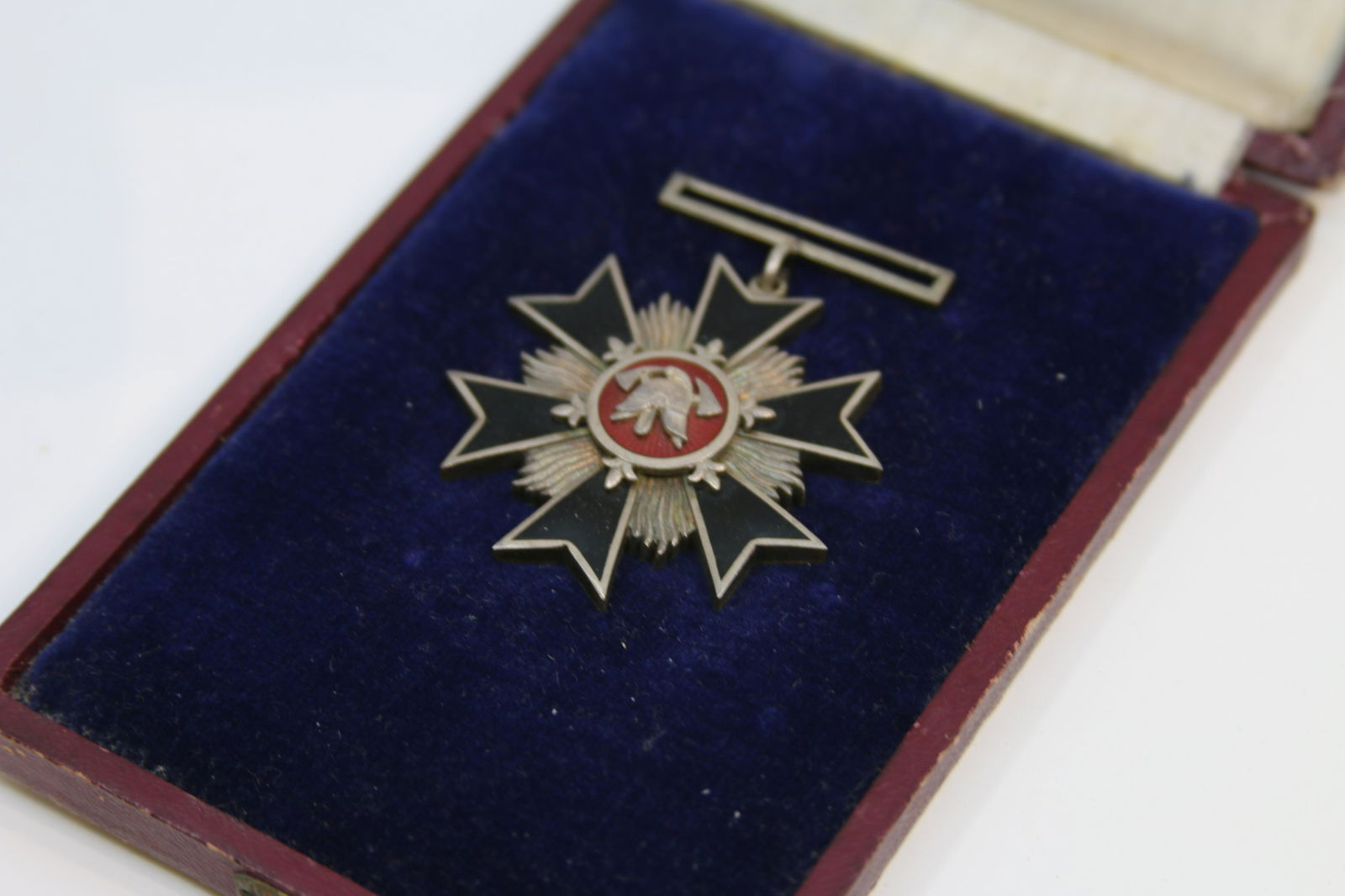 LITHUANIAN MEDAL PRE-1939 FIRE BRIGADE W/ HANGER 34.39g: LITHUANIAN MEDAL pre-1939 Fire Brigade w/Hanger 34.39 gms. Extra Fine Pre-1939 6 Ptd. Black Enamel Star with Silver Waves, Helmet and Axes on Red Enamel. Has loop and hanger but no ribbon. Comes with