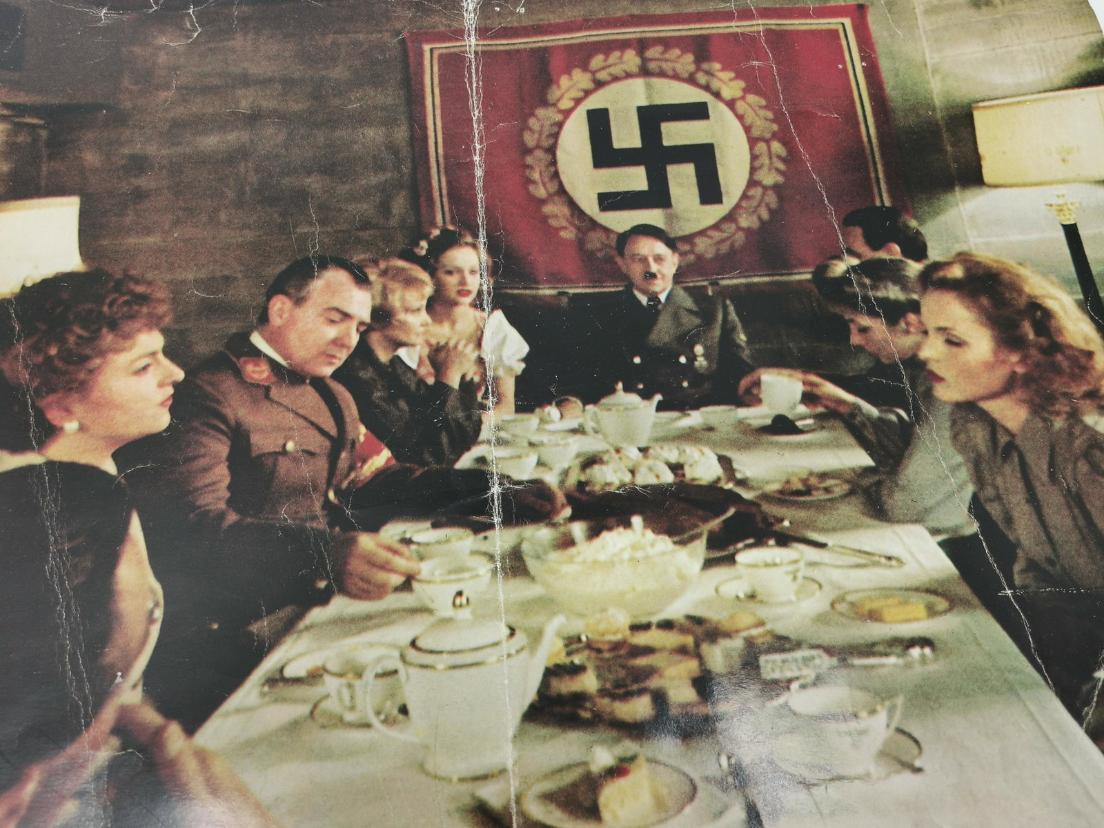 German WWII Dinner in the Bunker With Eva Braun Poster: Title: German WWII Dinner in the Bunker With Eva Braun Poster Description (FR): Poster d'un repas dans le Bunker de Hitler avec Eva Braun Description (ENG): German WWII Dinner in the Bunker With Eva B