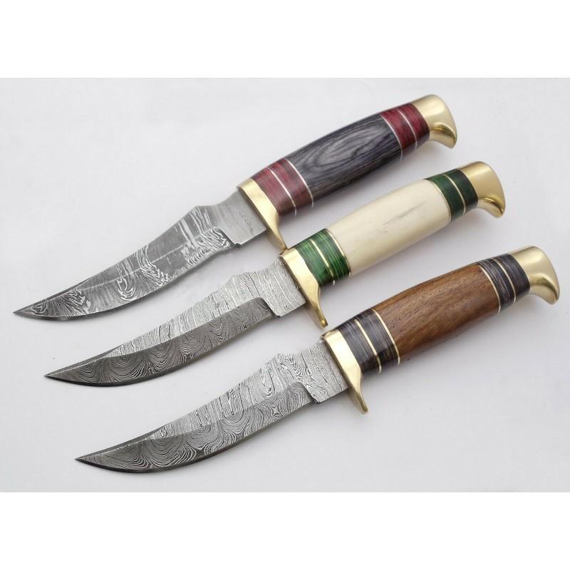Set 3 skinner hunting damascus steel knives bone wood: Set of 3 Knives "Emerald". Blade - damask steel. Handle â€“bone and woods with brass guards and pommel. Blade hardness â€“ 58-60 HRC. Total length â€“ 235 mm. Blade length - 121 mm. Han