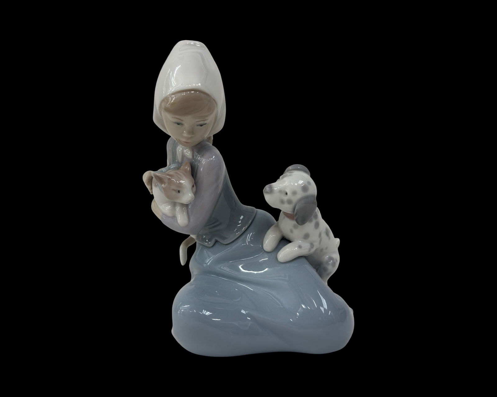 Lladro Porcelain Figurine, Little Friskies 1005032: Lladro #5032 "Little Friskies" 7" Porcelain Figurine with Glossy Finish Condition: no chips or cracksmeasures 7 x 5 inches