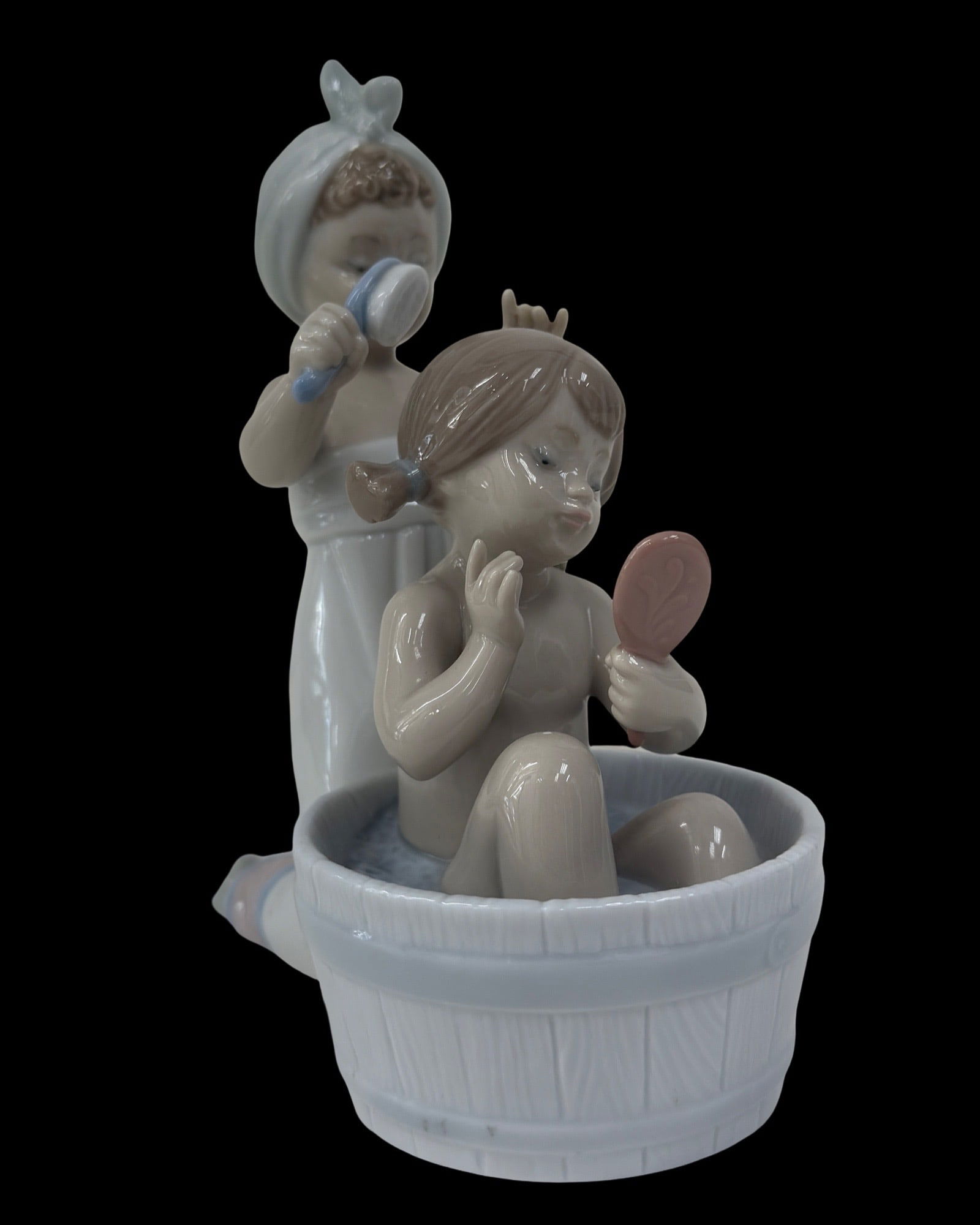LLADRO 6457 "BATHING BEAUTIES" PORCELAIN FIGURINE: Lladro Porcelain "Bathing beauty" Sculpture. Marked on the bottom "LLADRO" piece measures 7 x 4 x 6 inches.