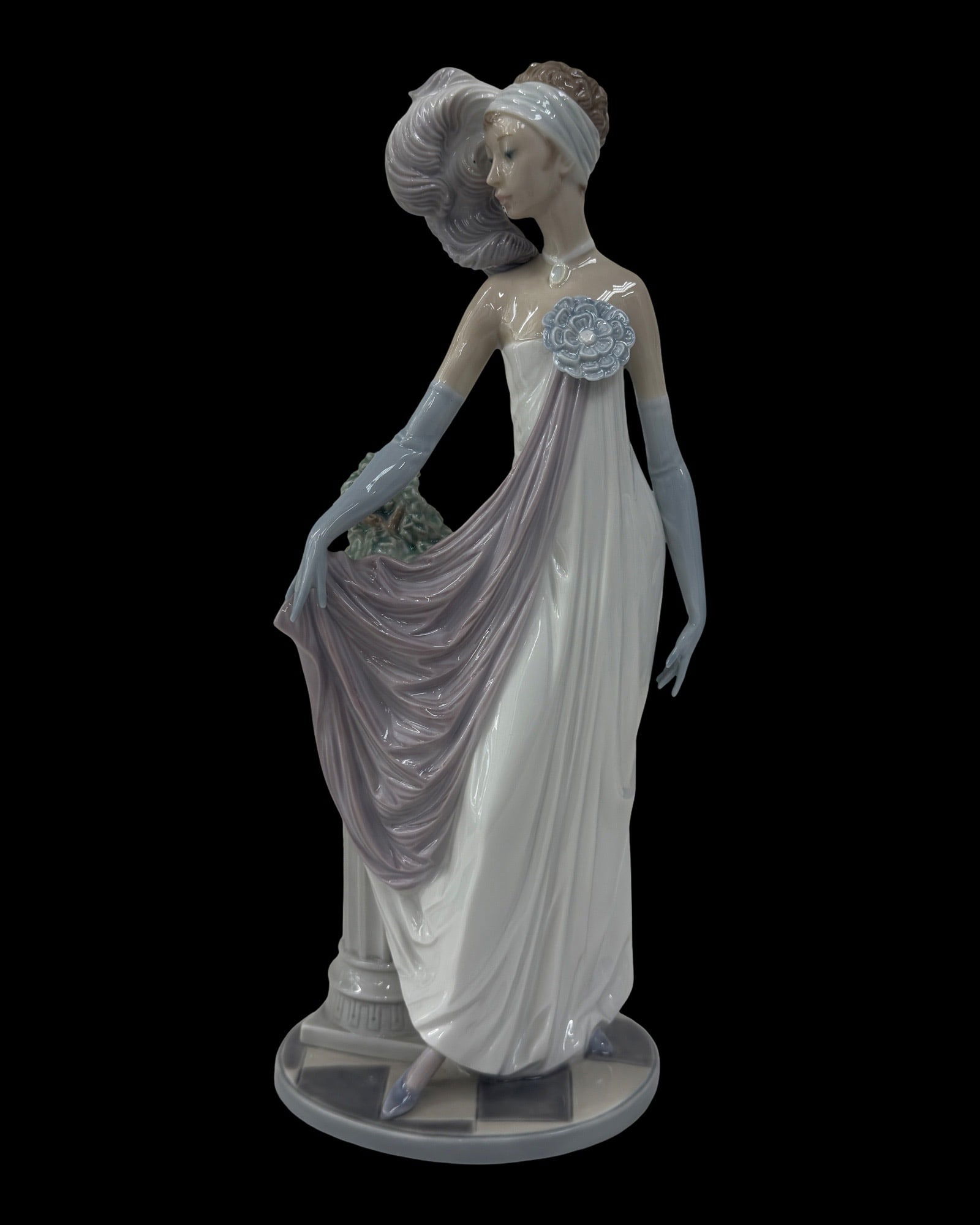 LLADRO PORCELAIN FIGURE, 'SOCIALITE,' #5283: Lladro porcelain figure,"Socialite of the 20s" (Dama Charleston), bearing blue maker's mark underfoot, stamped no.5283, A7-F, design by Vicente Martinez, young woman in draped garment, feather