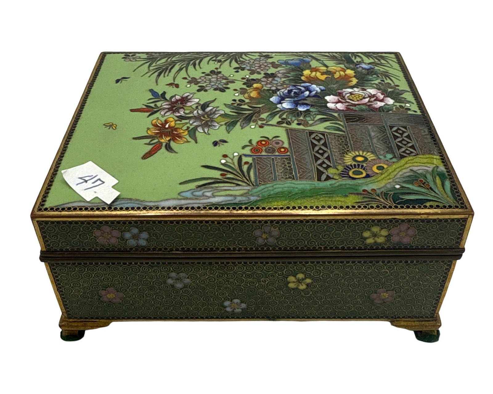 Gilt Bronze Box with Cloisonné & Champlevé Enamel work Japan: This late 19th-century Japanese box features a stunning floral scene primarily of morning glories. The enamel work is superb with delicate colors and a combination of Cloisonné & Champlevé work. The