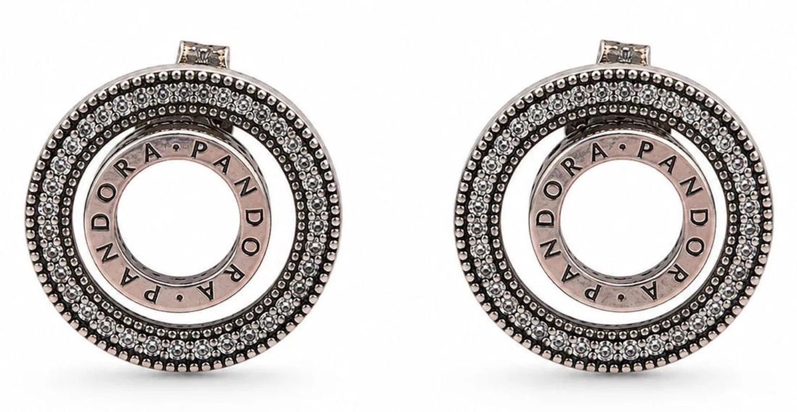 Pandora Sparkling Open Circle Halo Stud Earrings Sterling Silver S925: Elegant Pandora open circle halo stud earrings crafted in sterling silver ( S925 ALE ) . Each earring features a polished open-circle center surrounded by a halo of sparkling clear cubic zirconia with