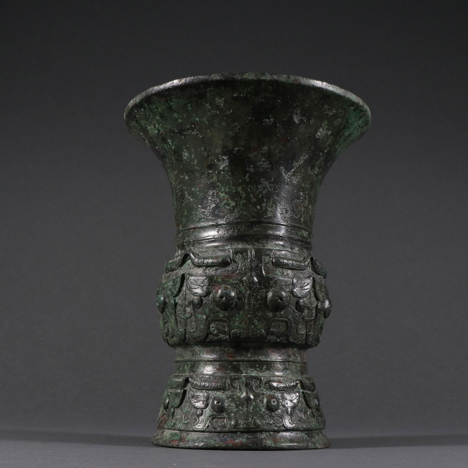 A Rare Bronze 'Tao Tie' Gu (1 of 9)