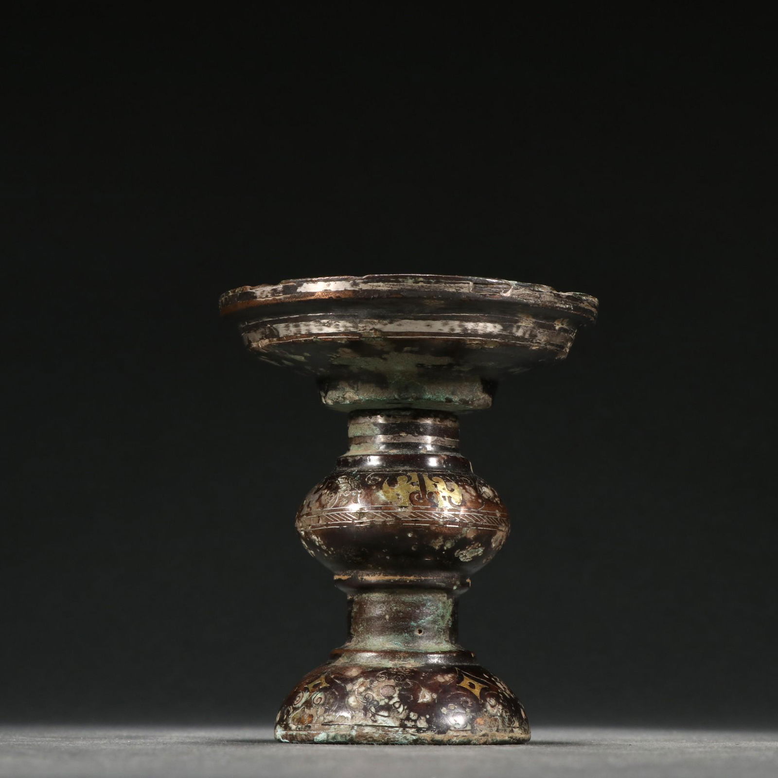 A Fine Bronze Inlaid Silver Candlestick (1 of 9)