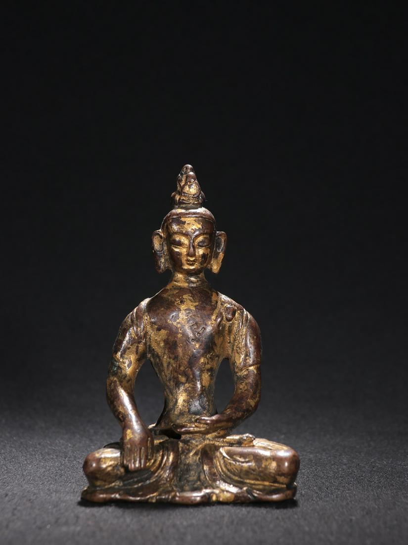 A Small Gilt-bronze Figure of Buddha (1 of 9)