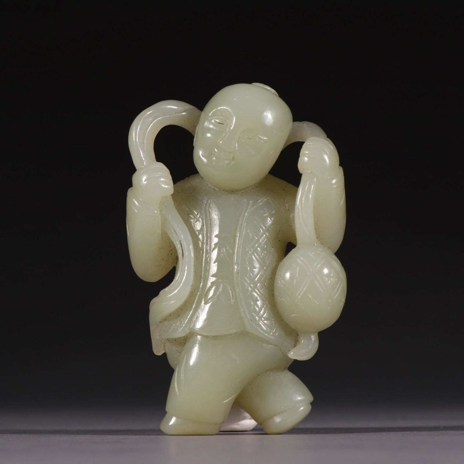 A Delicate Jade Carved Boy Ornament (1 of 9)