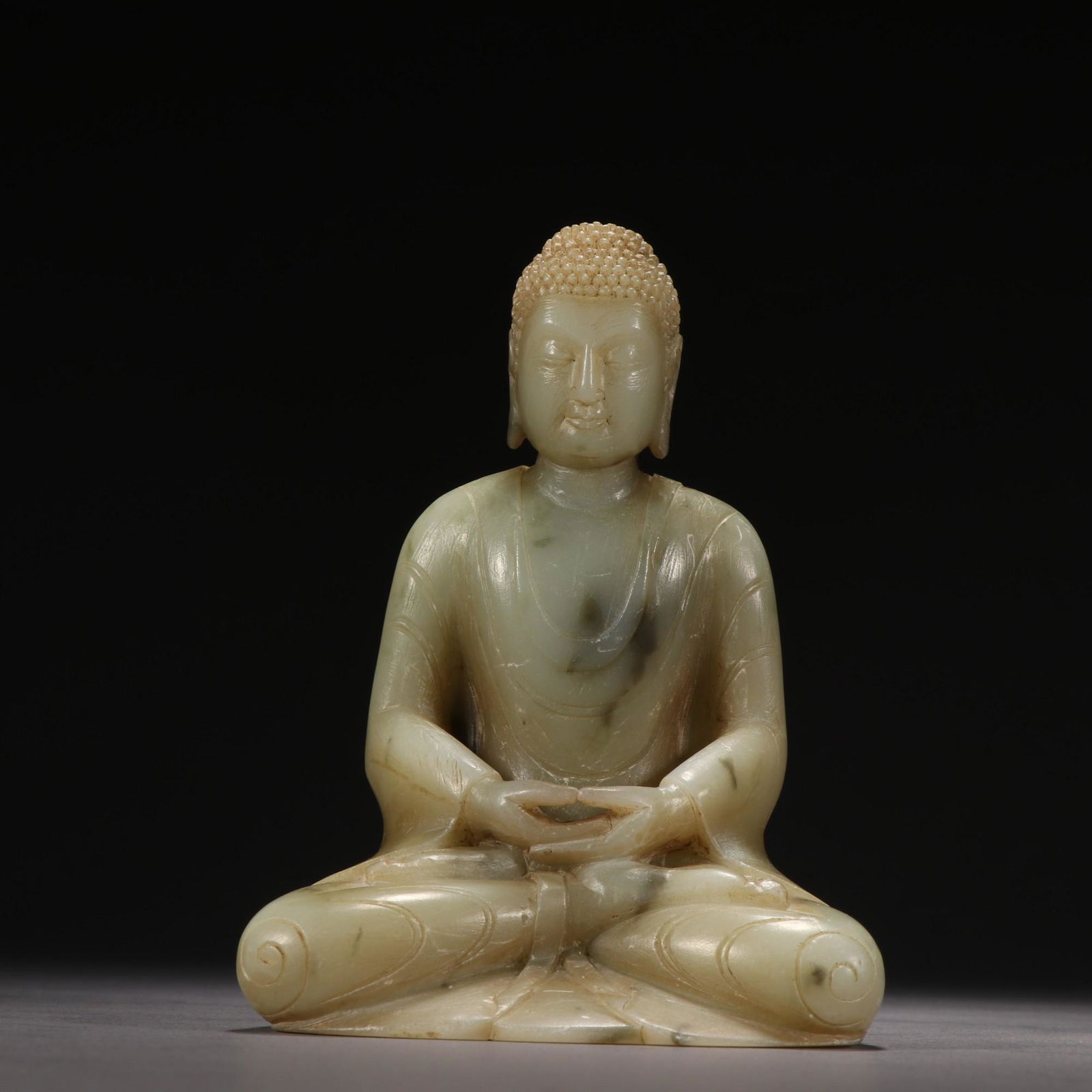 A Rare Jade Figure of Shakyamuni (1 of 9)