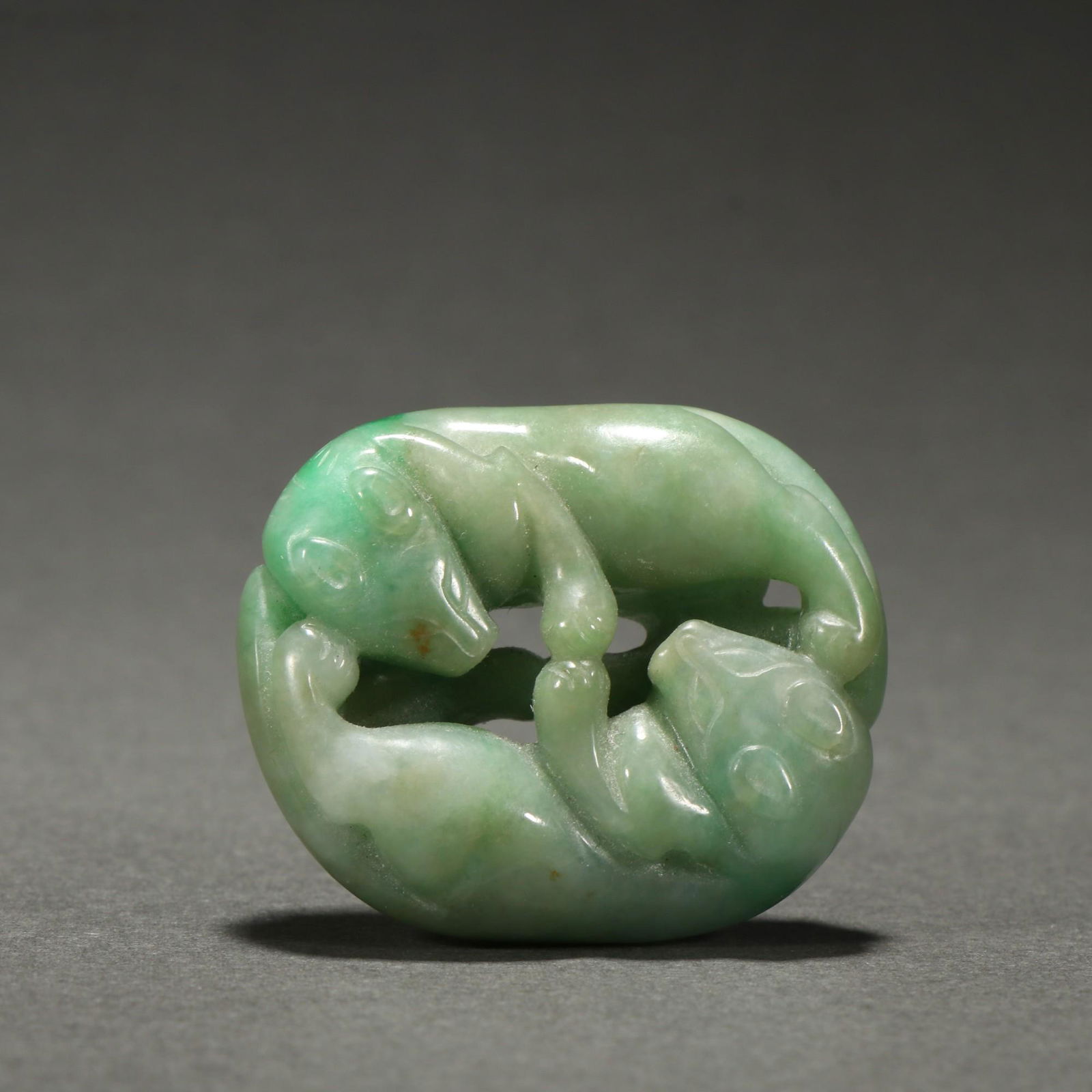A Delicate Jadeite Double Beast Pendant (1 of 9)