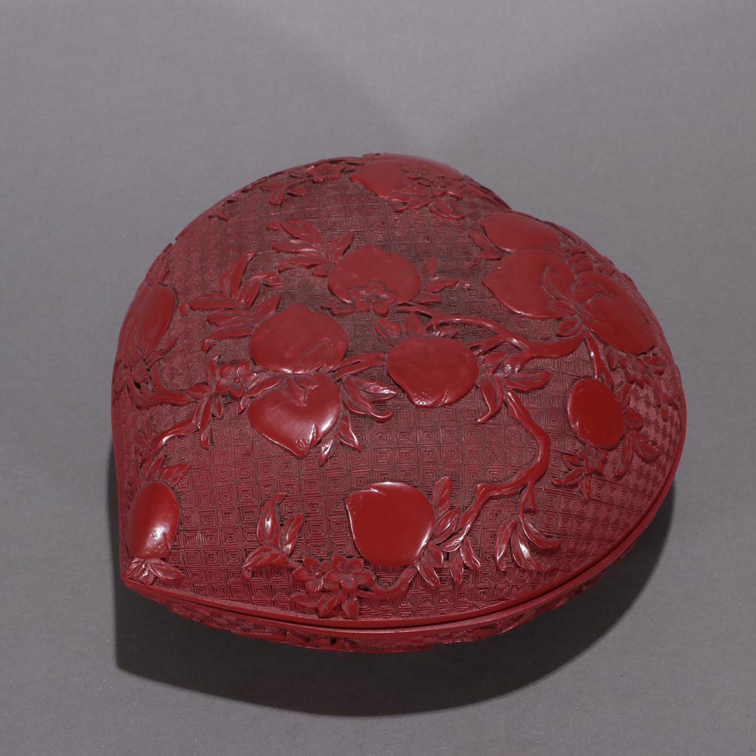 A Fine Carved Cinnabar lacquer 'Shou Tao' Box (1 of 9)